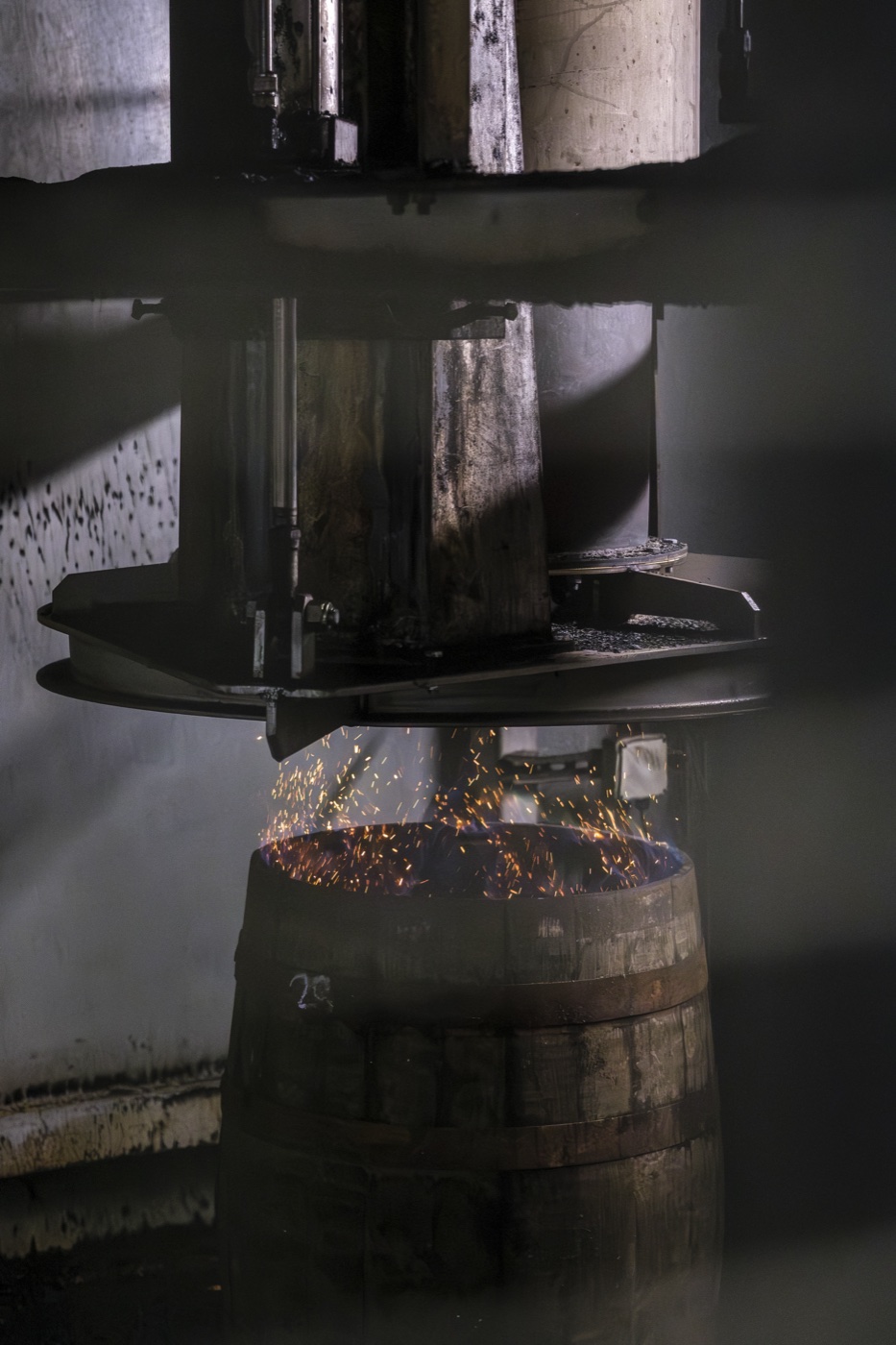 Sparks above an oak cask during cooperage work at Cambus